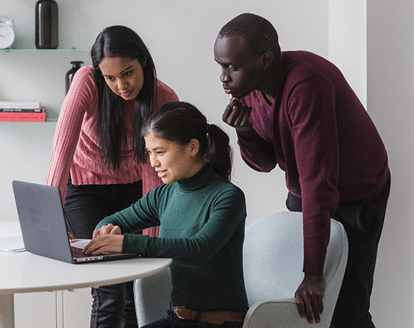 Students around laptop